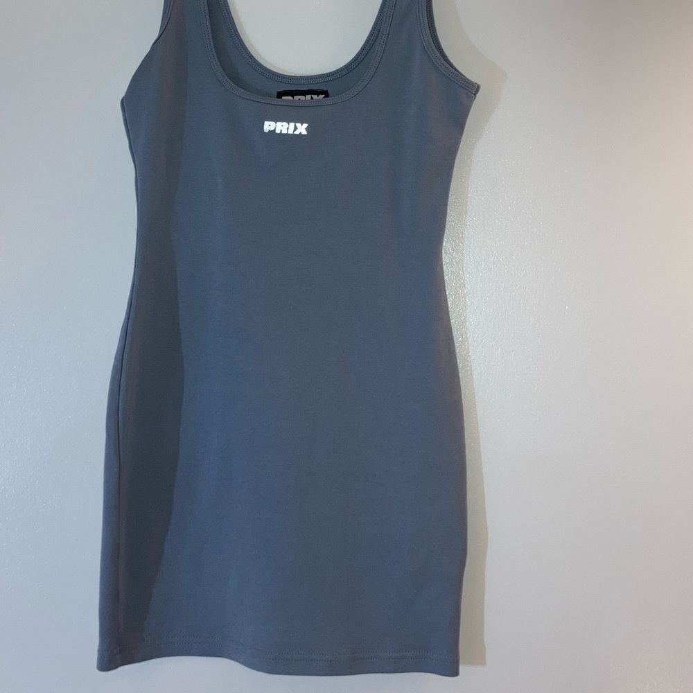 Prix NEVER WORN technically size M but is small